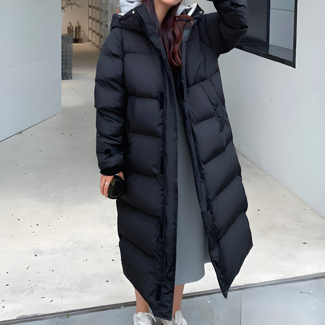 Front view showing hood, full-length zip and quilted body