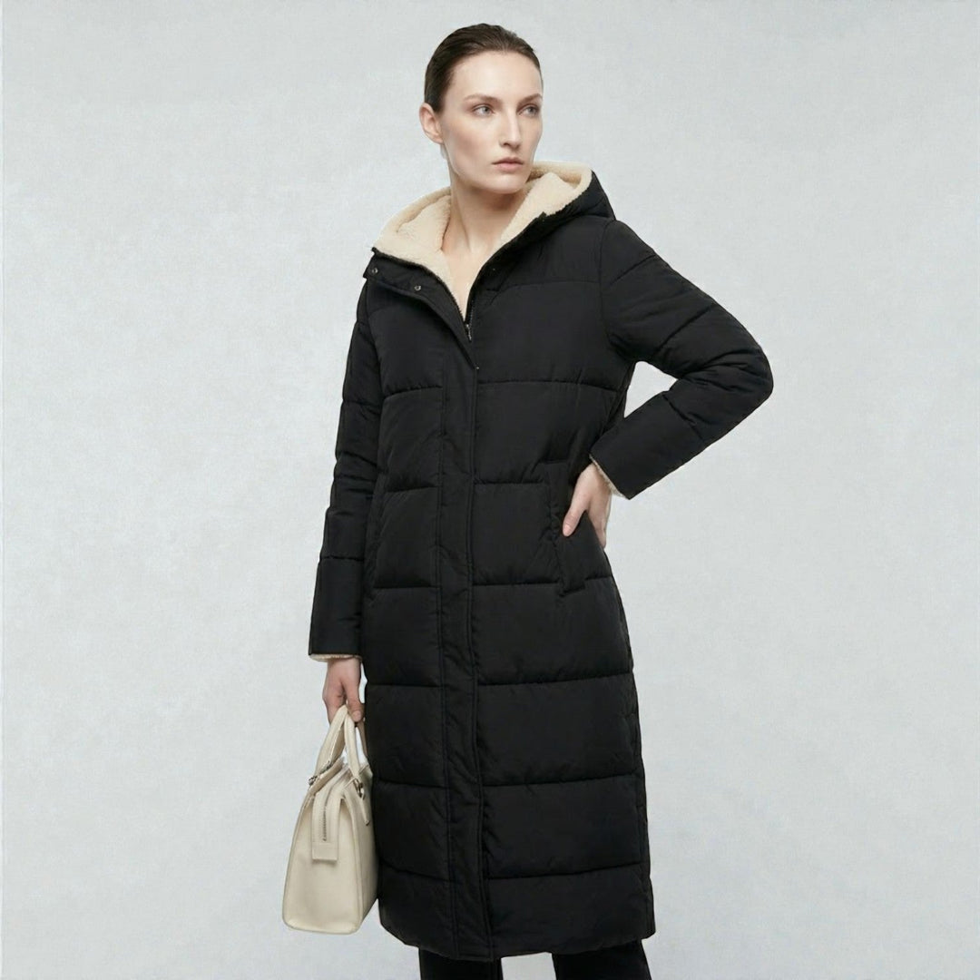 Front view showing hood, quilted body and side pocket