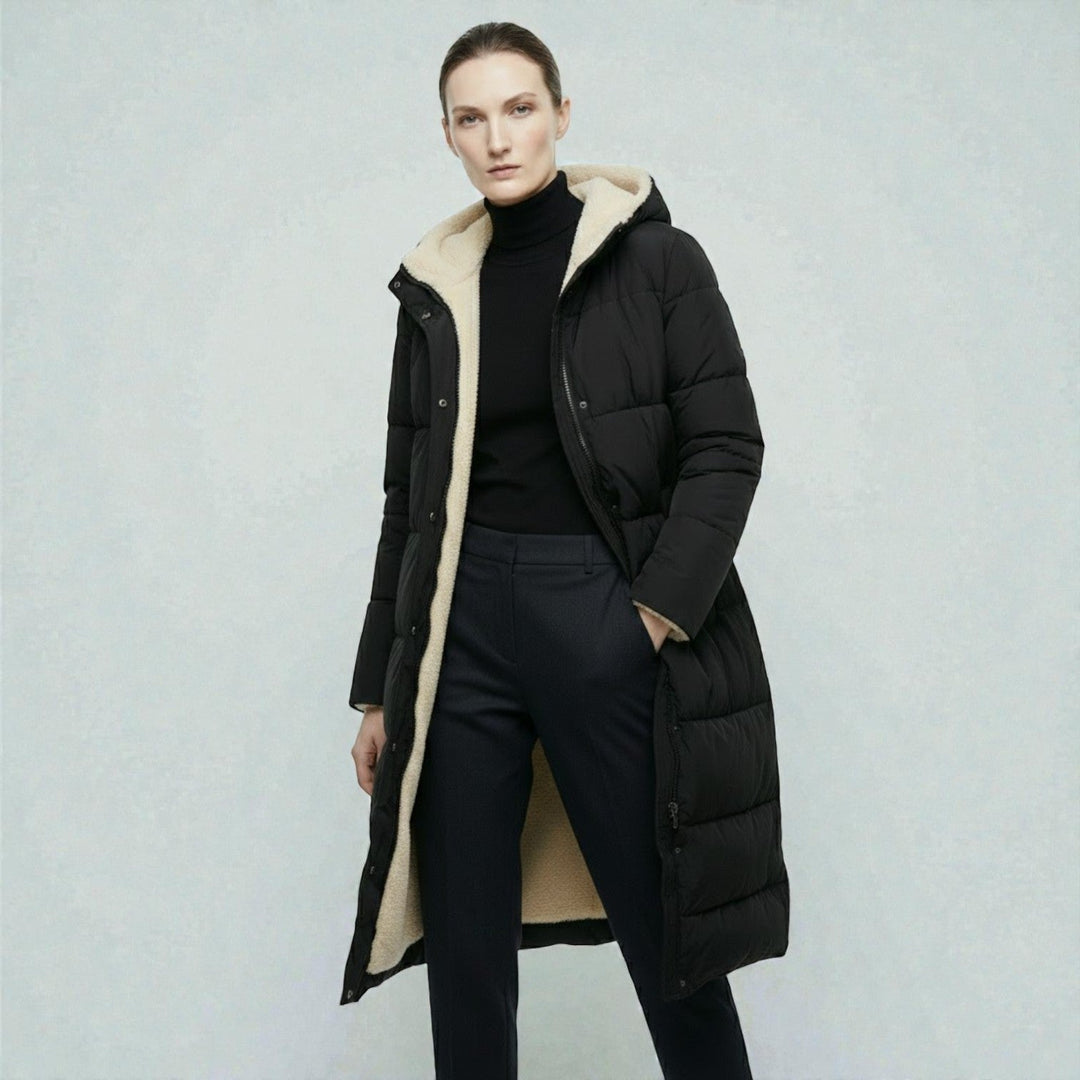 Side view showing hood, stand collar and zip front, black