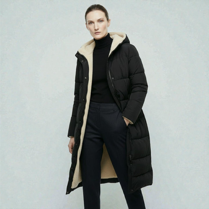 Side view showing hood, stand collar and zip front, black