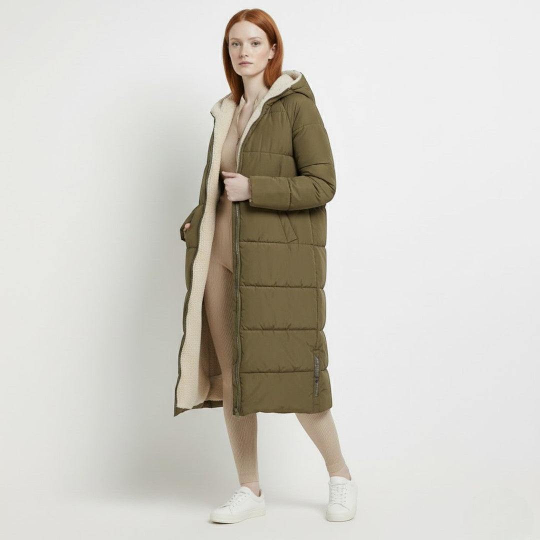 Side view showing hood, zip front and ankle-length hem
