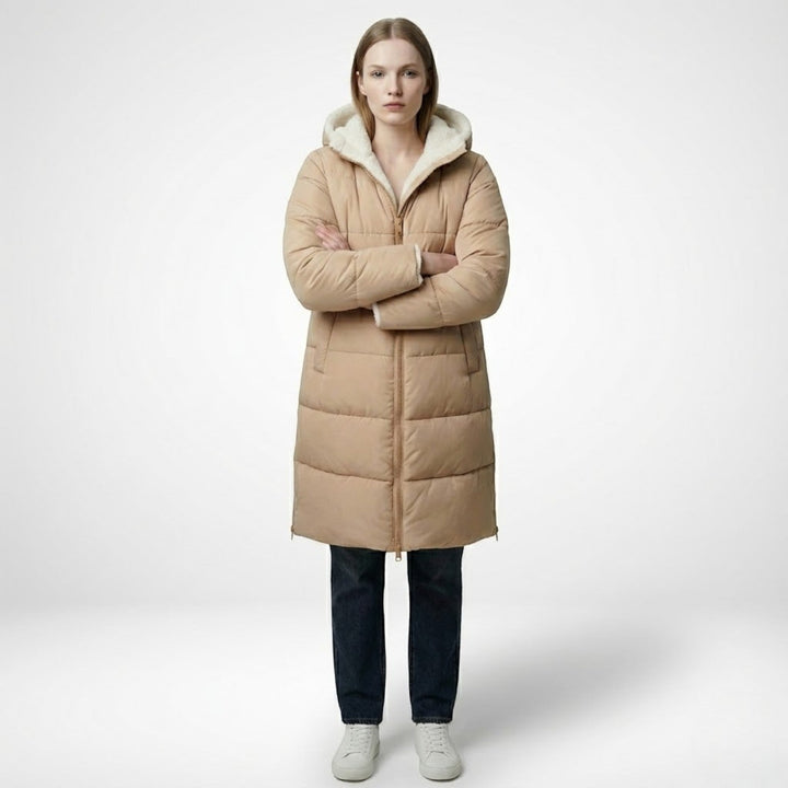 Front view showing hood, quilted body and ankle-length hem