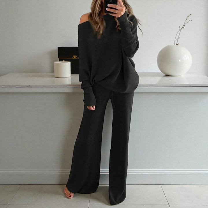 Front view showing boat neckline and drawstring banded waist, black