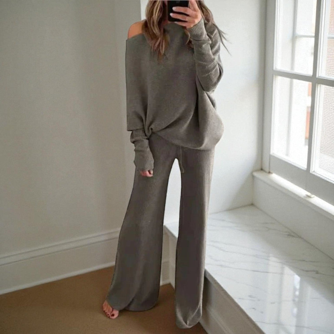 Front view showing long sleeves and wide legs, grey