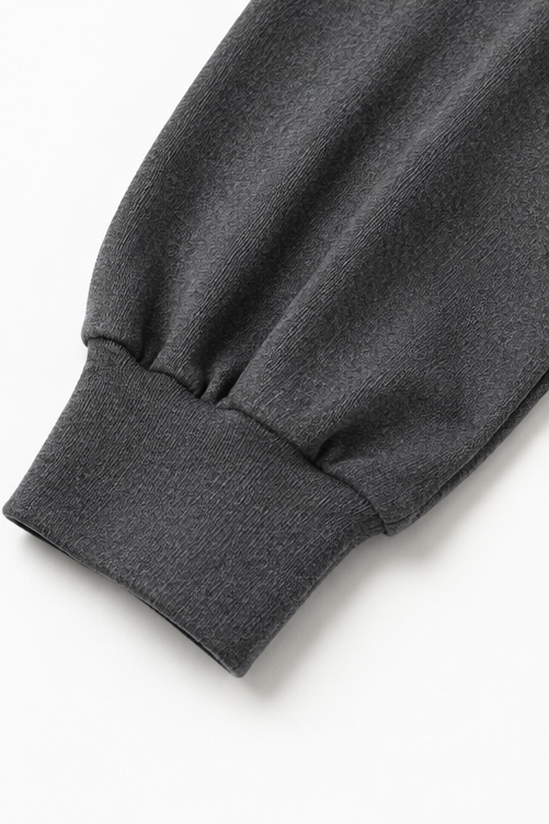 Detail view of the long sleeve and banded cuff