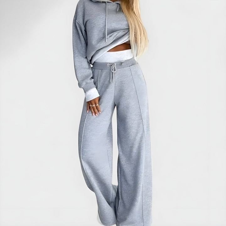 Front view of hooded top with drawstring and wide leg trousers with drawstring waist, szary