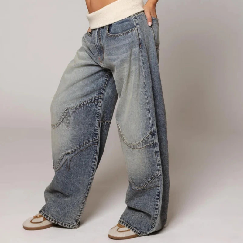 Side view showing wide legs and curved stitched panels