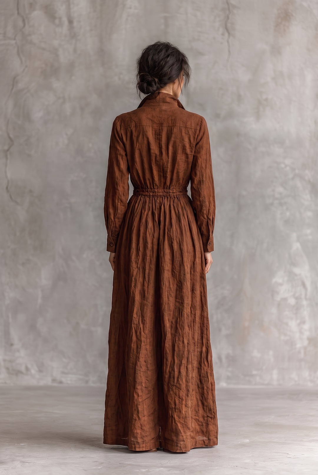 Back view showing stand collar, banded gathered waist and gathered skirt