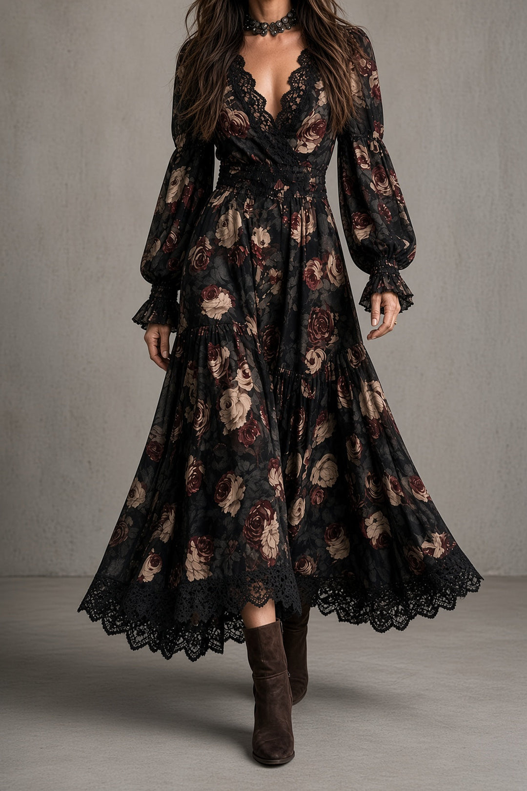 Front view of floral midi dress with v-neckline, long sleeves, banded waist and tiered skirt with scalloped lace hem, black