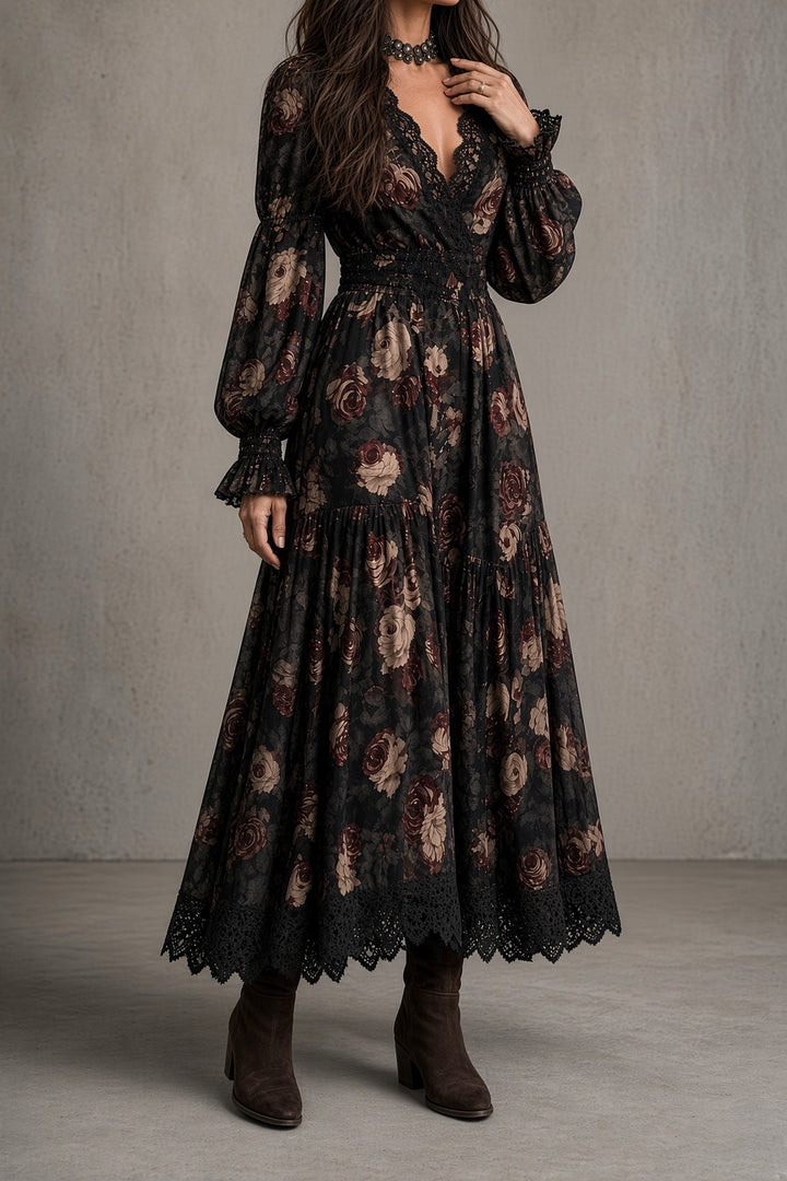 Front view with v-neckline, long sleeves, banded waist and tiered skirt with lace hem