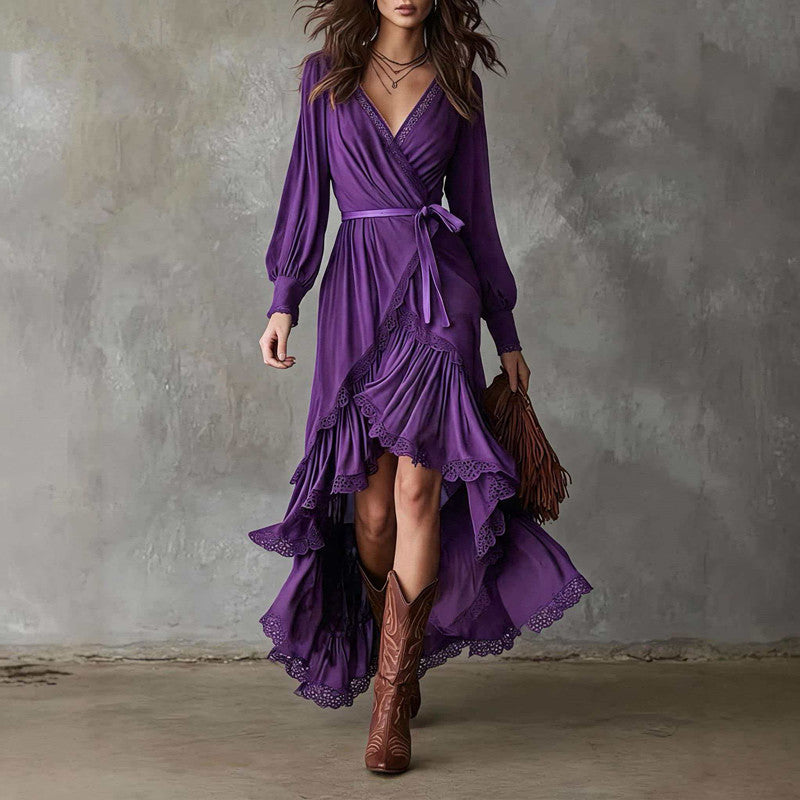Front view of maxi dress with v-neckline, long sleeves, wrap bodice, waist tie and tiered ruffle high-low hem, purple
