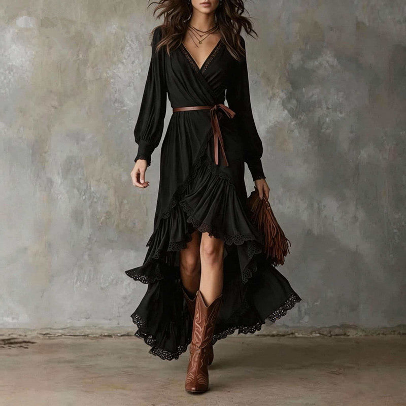Front view of v-neckline, wrap bodice, waist tie and tiered ruffle skirt, black