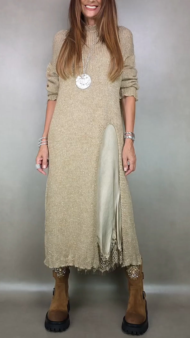 Front view of mock neckline, long sleeves, front slit and lace hem, beige