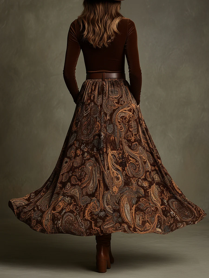 Back view of top with banded waist and floor-length skirt