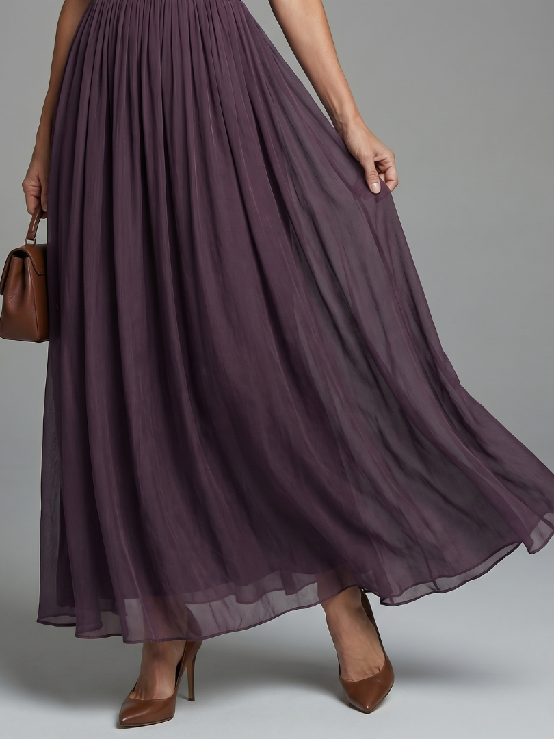 Detail view of gathered skirt and ankle-length hem