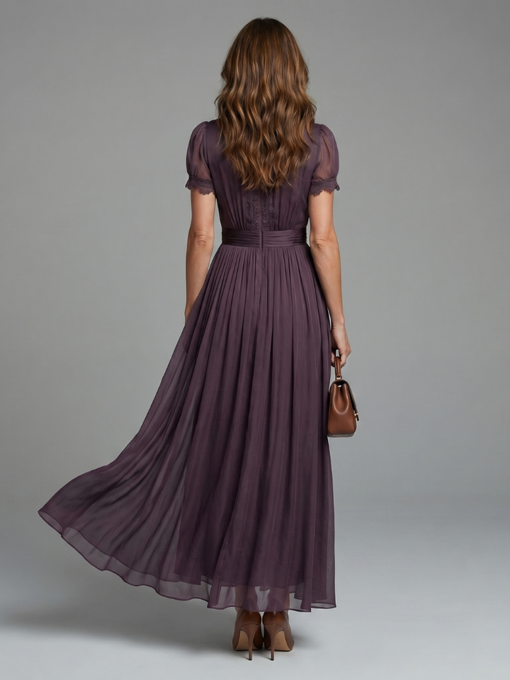 Back view showing gathered bodice, banded waist and gathered skirt
