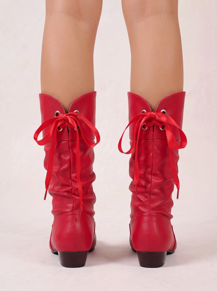 Back view showing bow tie back lacing and eyelets