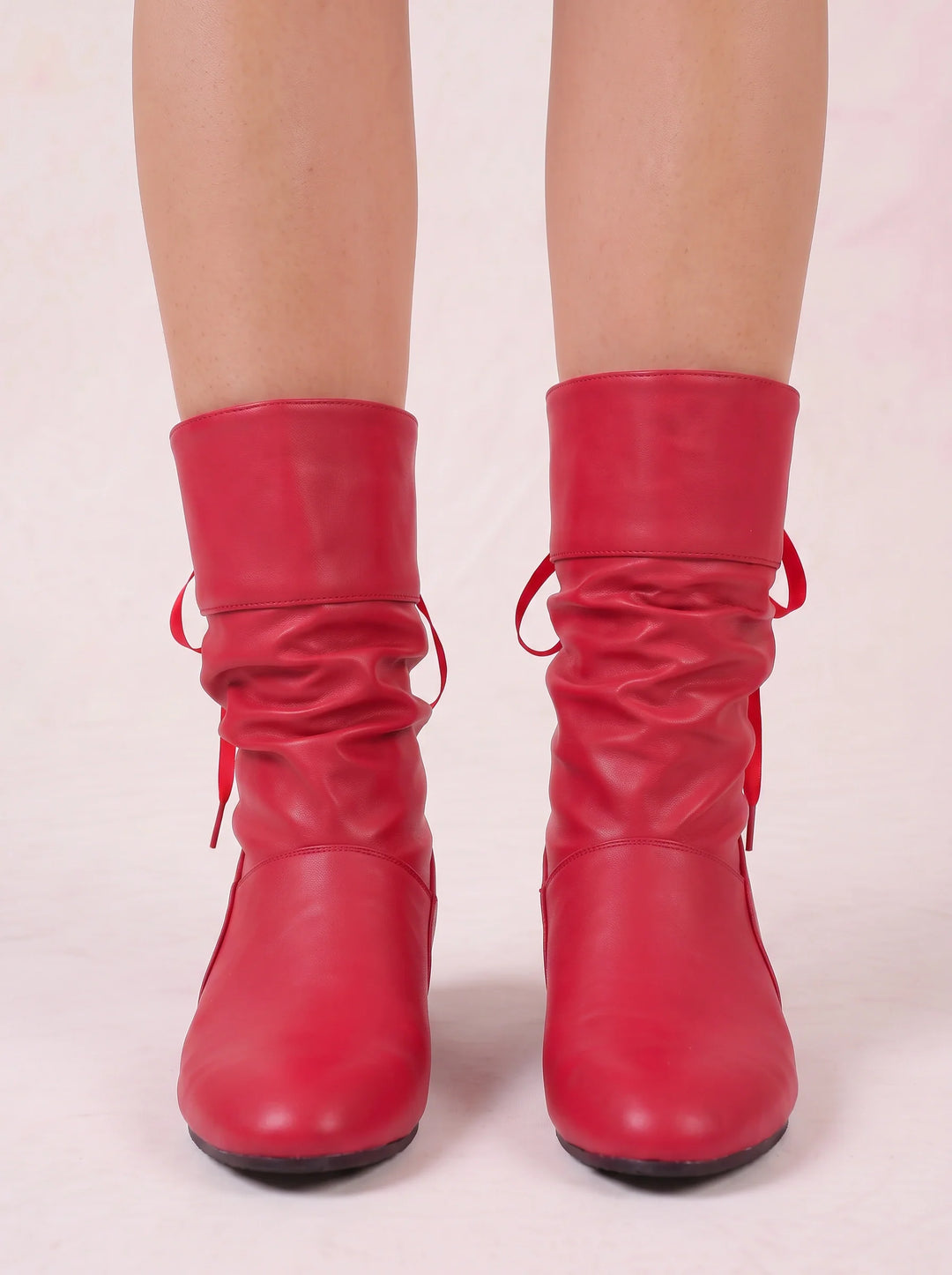 Front view showing ruched shaft and rounded toe
