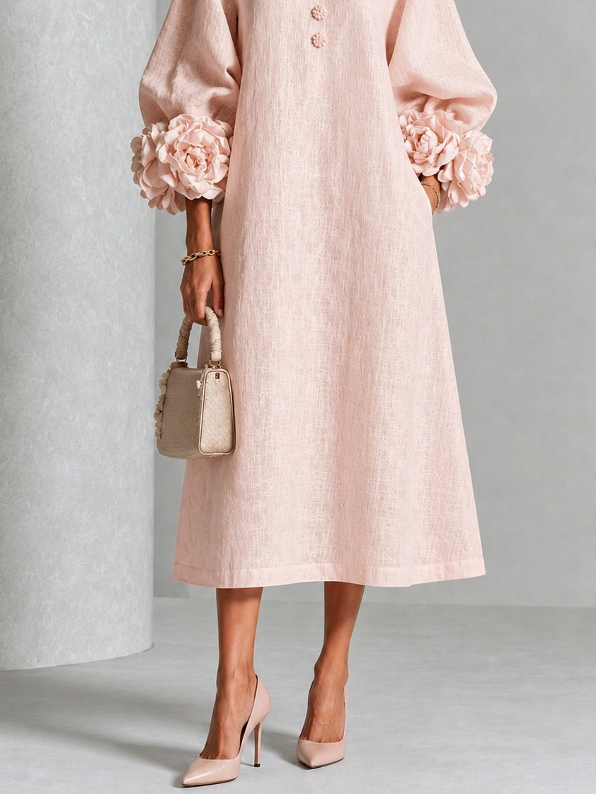 Front view showing floral cuffs, button placket and mid-calf hem