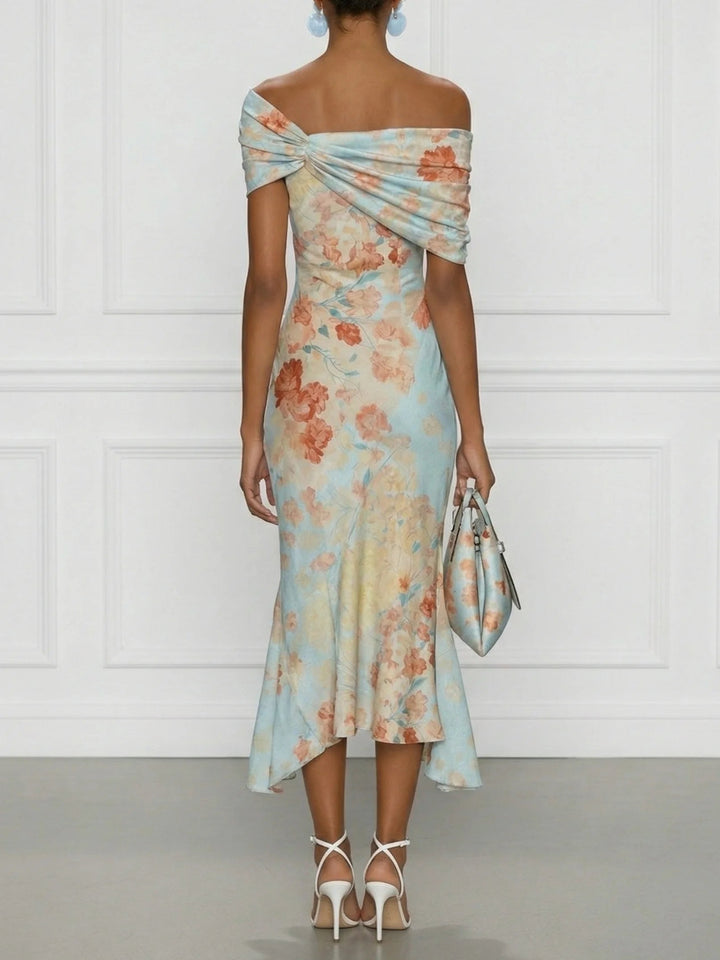 Back view of off-shoulder dress with twisted back and ruffle hem