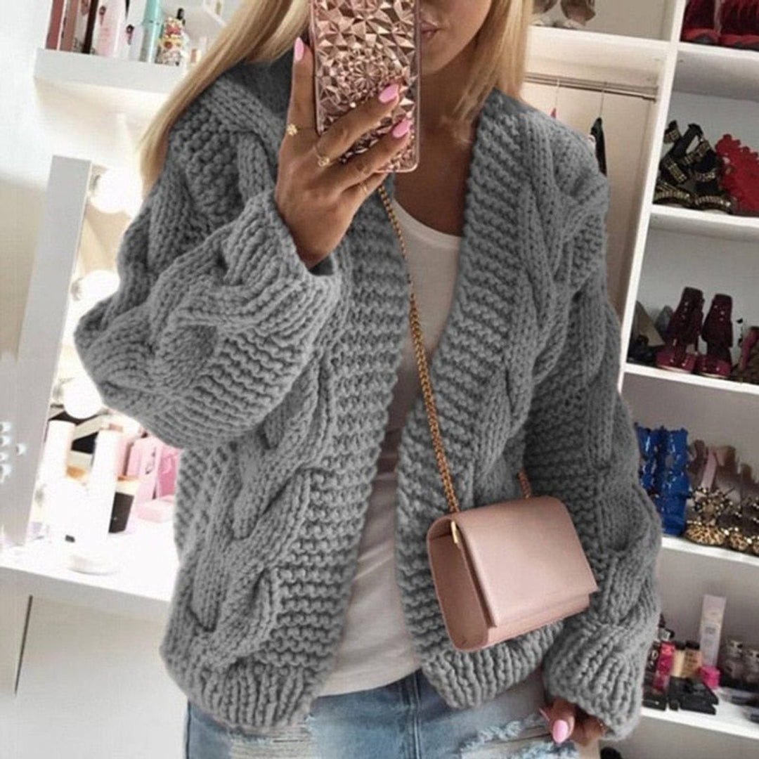 Front view of open front cardigan with cable knit sleeves, grey