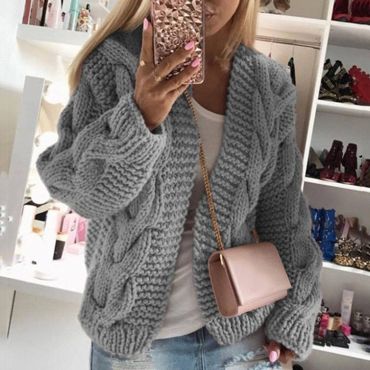 Front view of open front cardigan with cable knit sleeves, grey