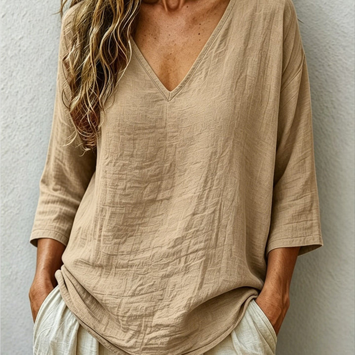Front view showing v-neckline and three-quarter sleeves, khaki
