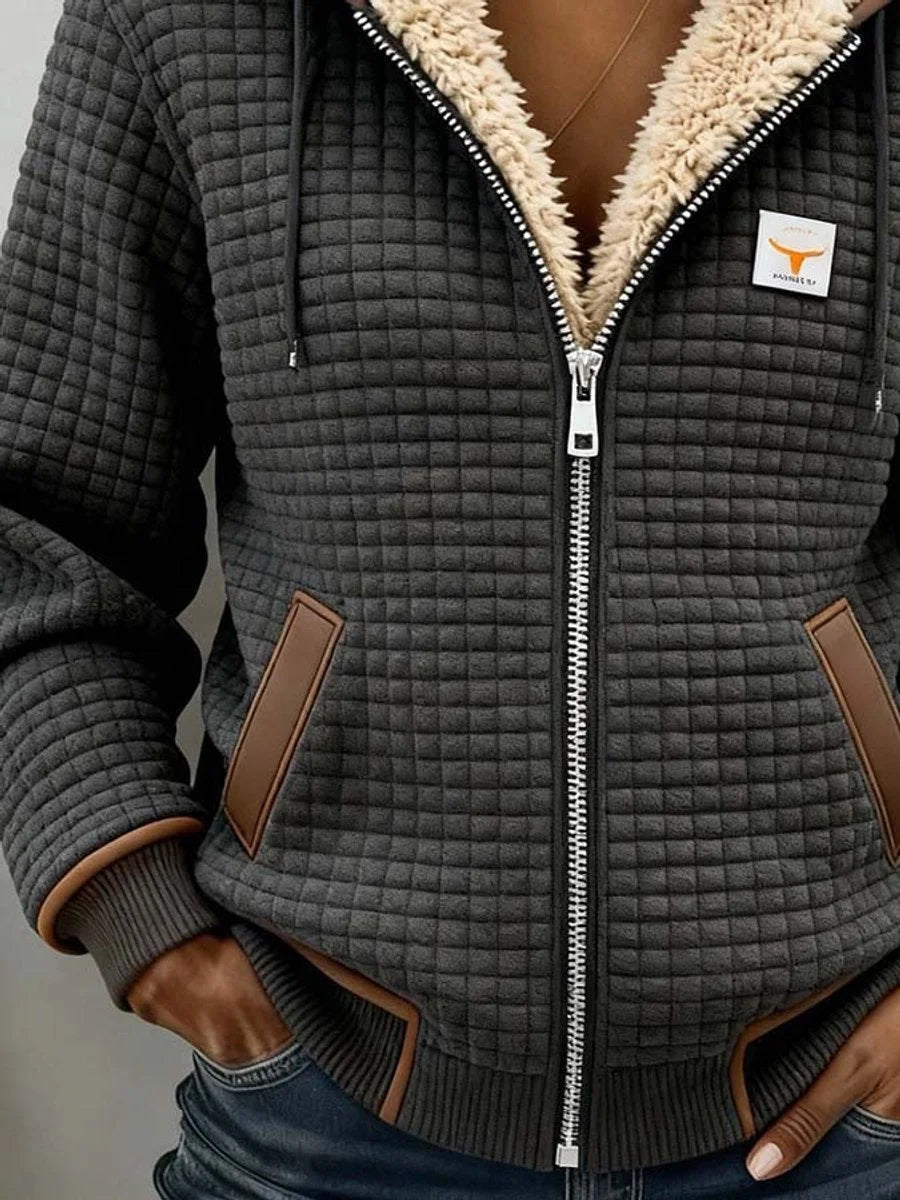 Detail view of side pockets with contrast trim and banded cuffs