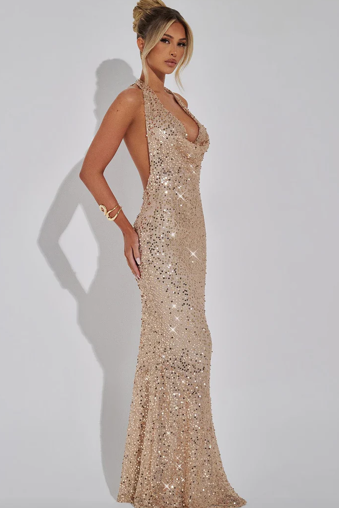 Side view of halter neckline and open back, gold
