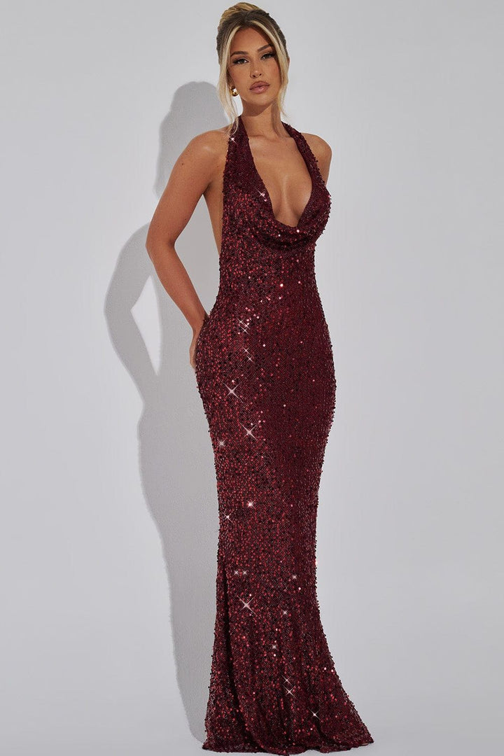 Front view of deep v halter neckline and flared sequin skirt