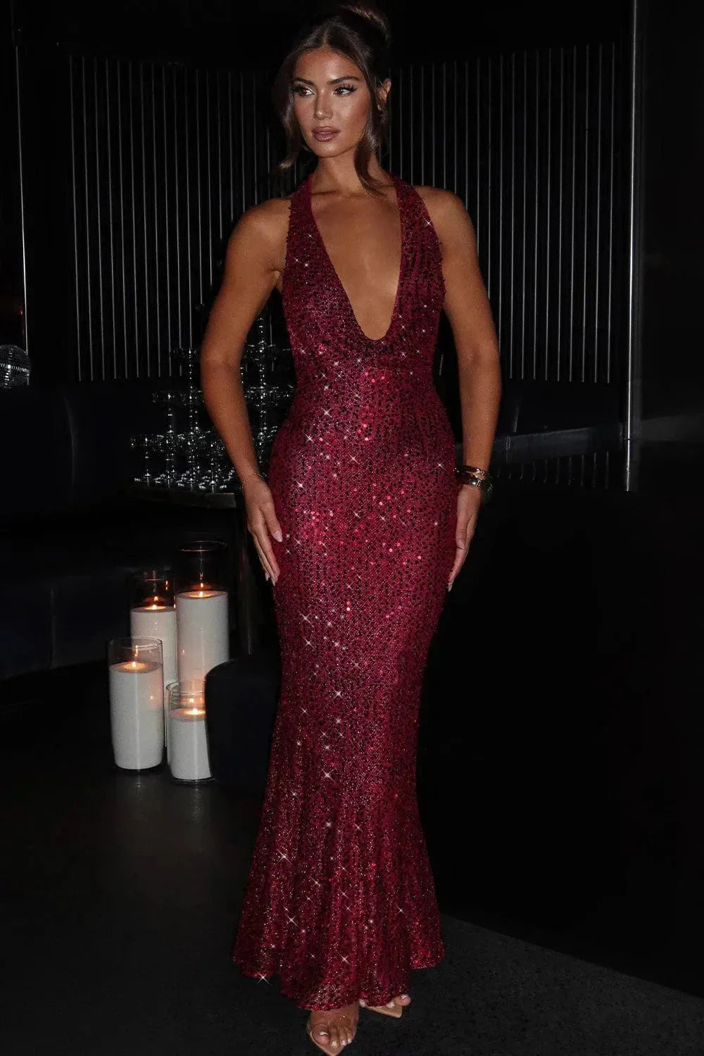 Front view of deep v halter neckline and sequin bodice