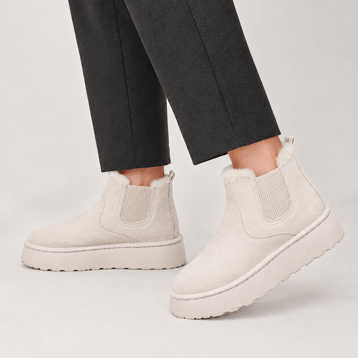 Side view showing the upper, side panel and platform sole, off white