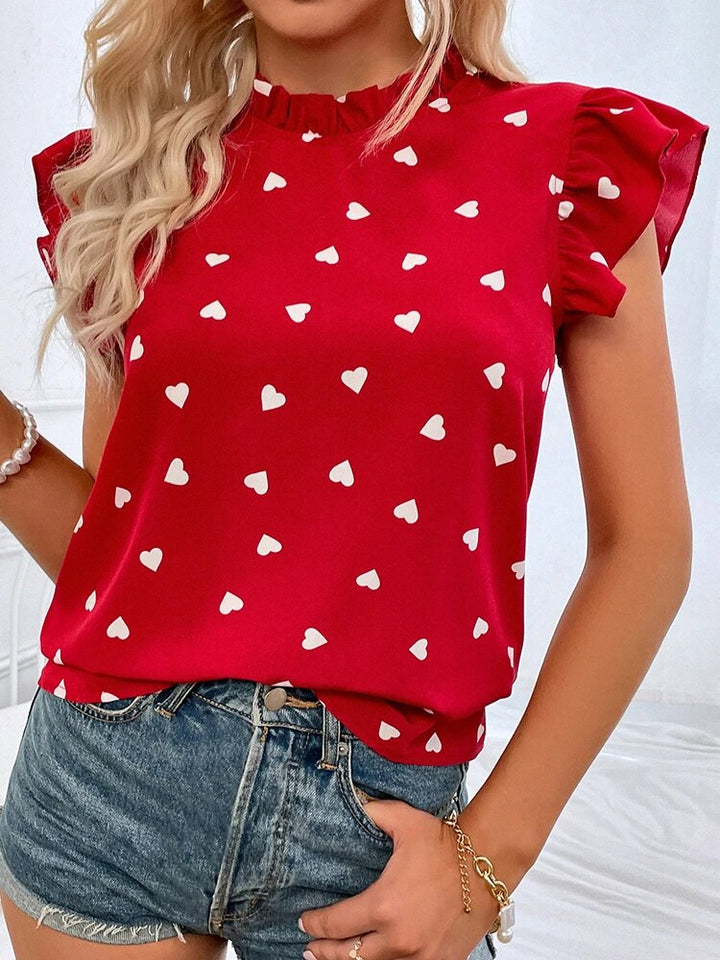 Women’s Top with Ruffle Neck and Heart Print