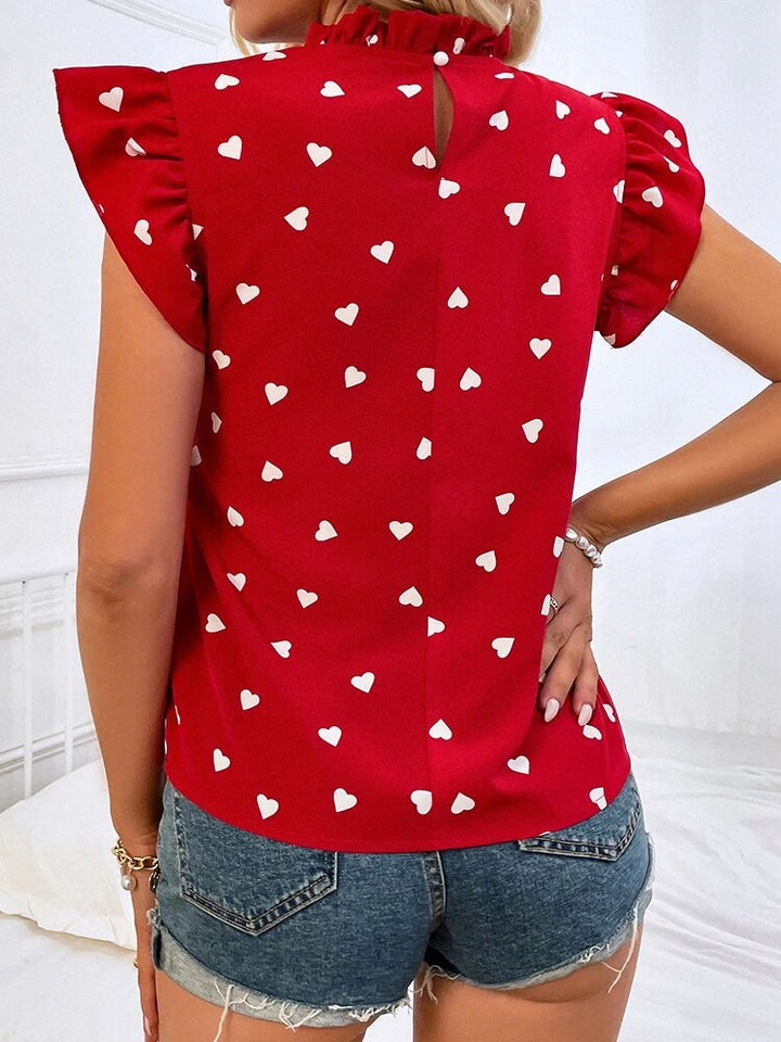 Women’s Top with Ruffle Neck and Heart Print