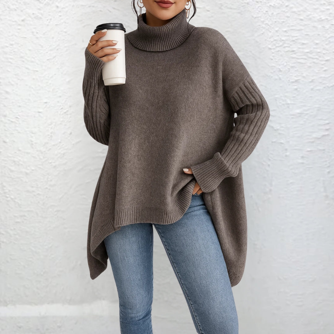 Front view showing turtleneck and ribbed sleeves, brown