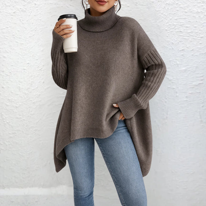 Front view showing turtleneck and ribbed sleeves, brown