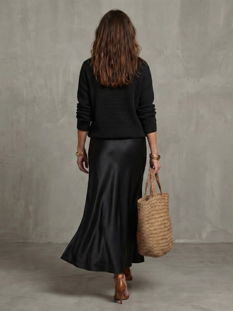 Back view of jumper and skirt