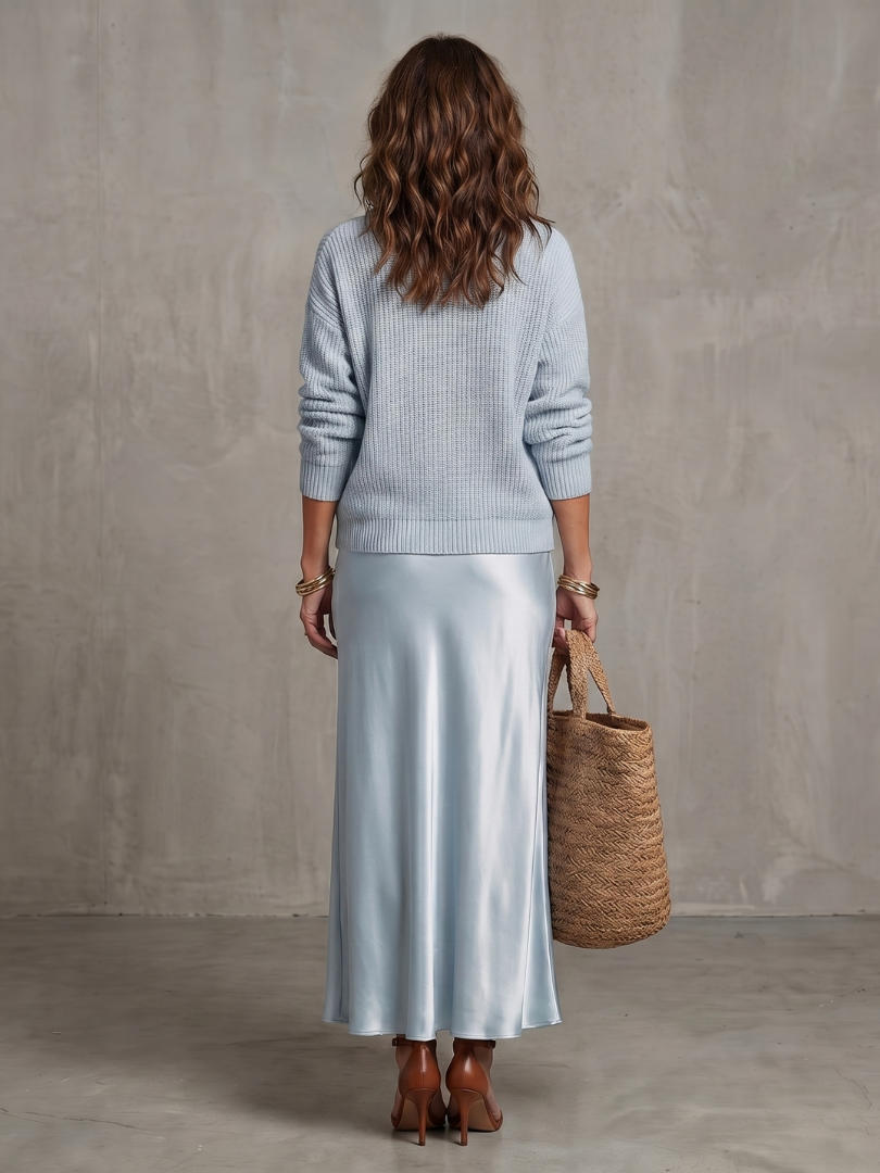 Back view of jumper and skirt