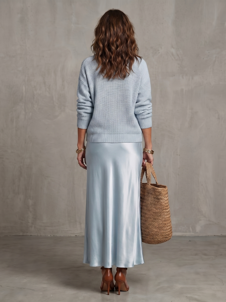 Back view of jumper and skirt