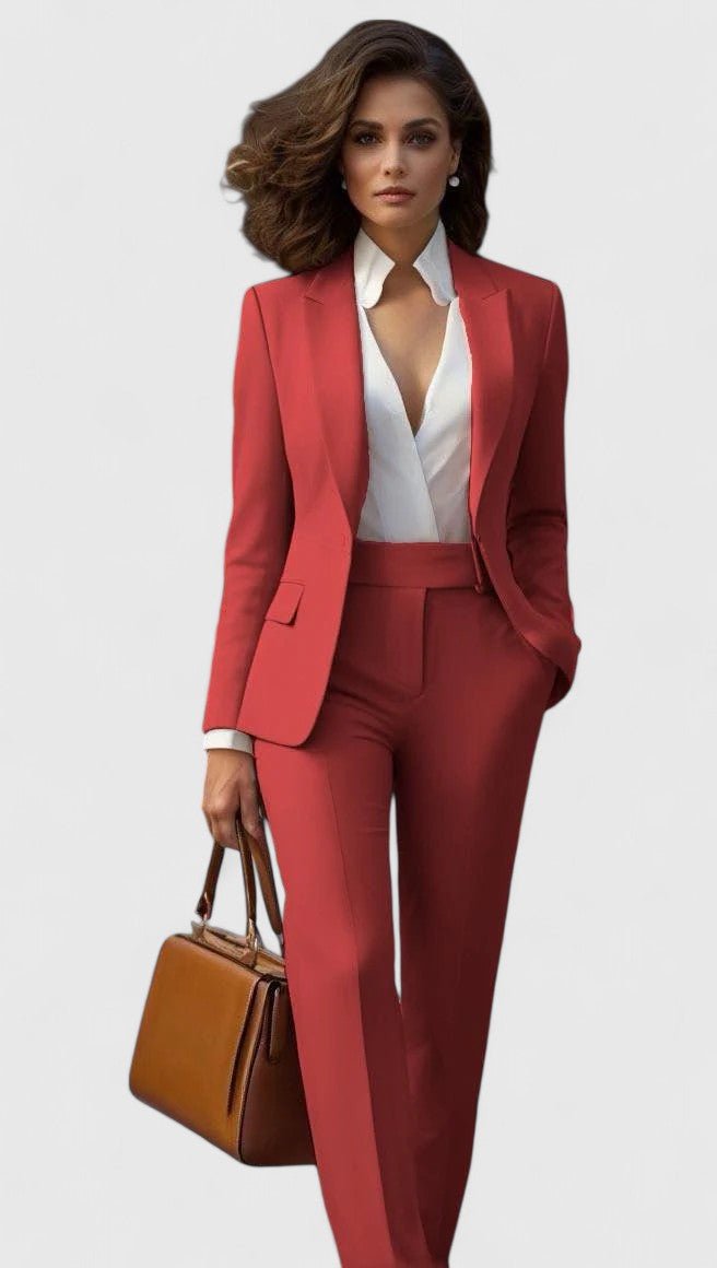 Front view showing lapels, button closure and straight legs, light red