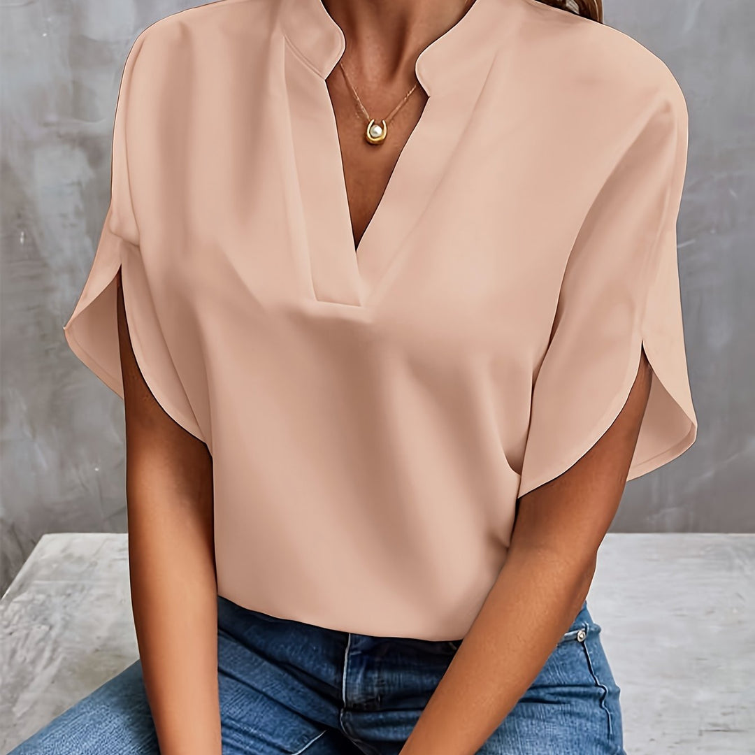 Front view showing v-neckline and short sleeves, beige
