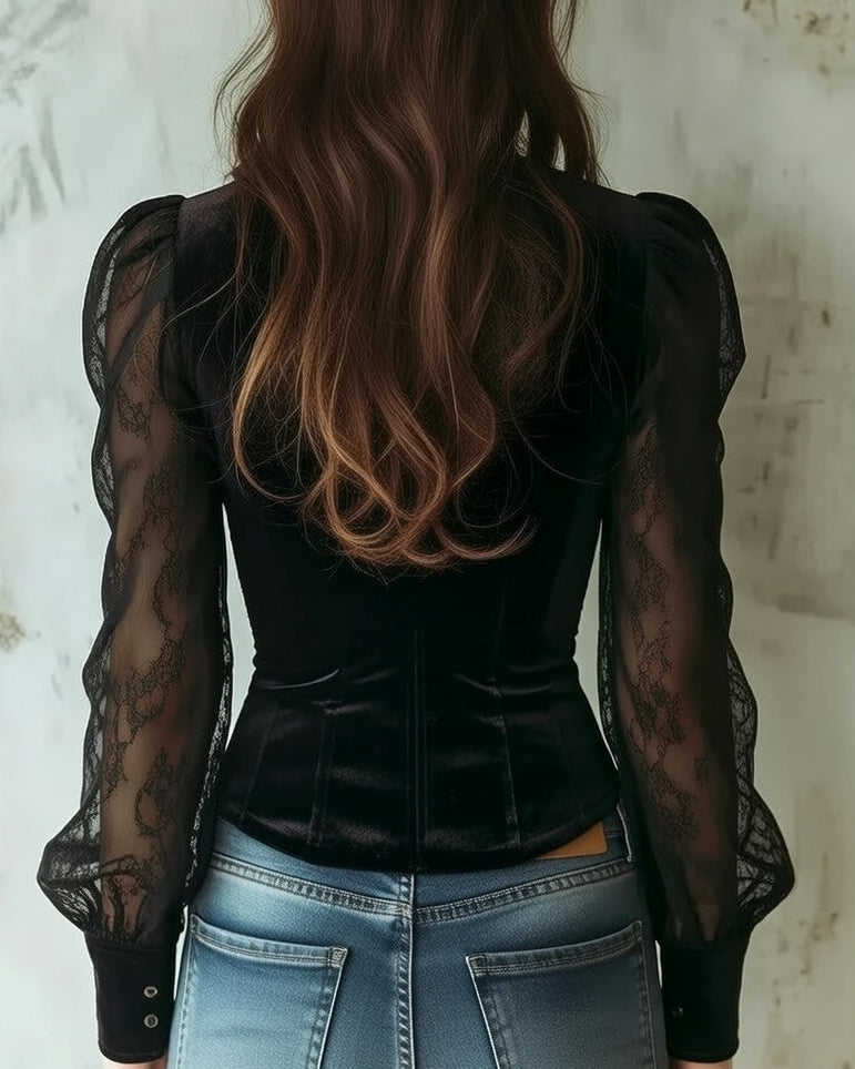 Back view with panelled stitched seams and lace sleeves