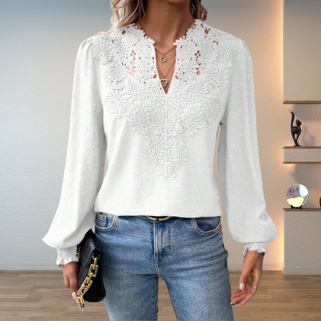 Front view showing v-neckline with lace panel and long sleeves, white