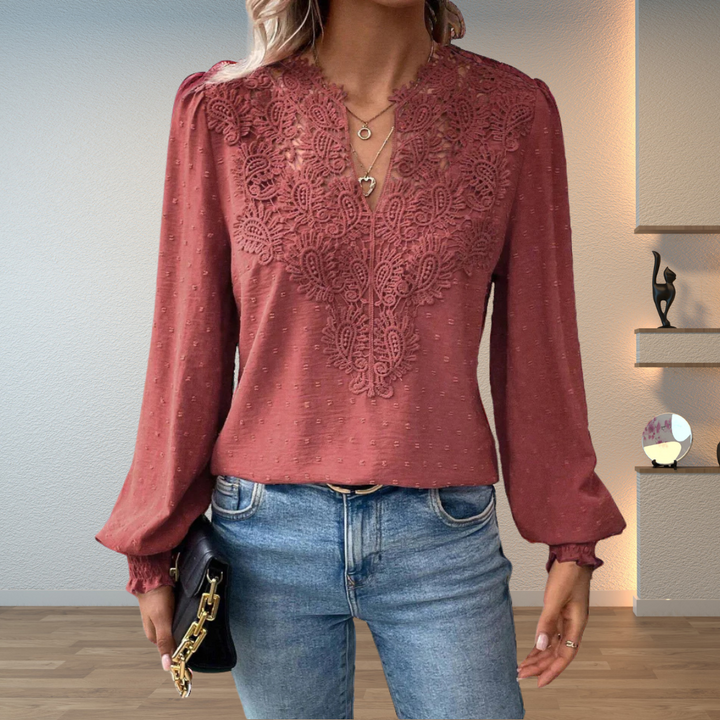 Front view showing v-neckline with lace panel and ruffled cuffs, red
