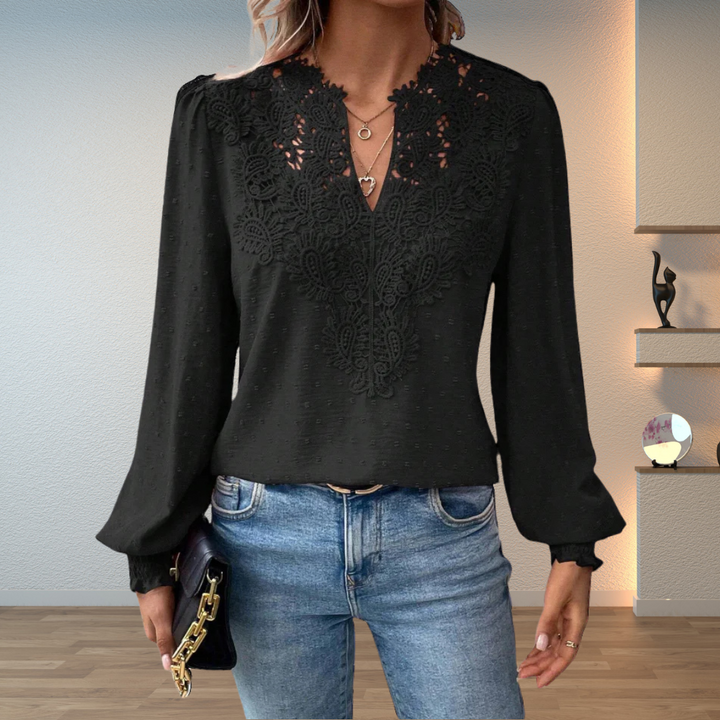 Front view showing v-neckline with lace panel and long sleeves, black