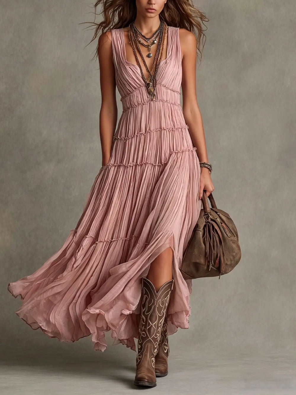 Front view showing deep v-neckline, pleated bodice and tiered skirt, pink