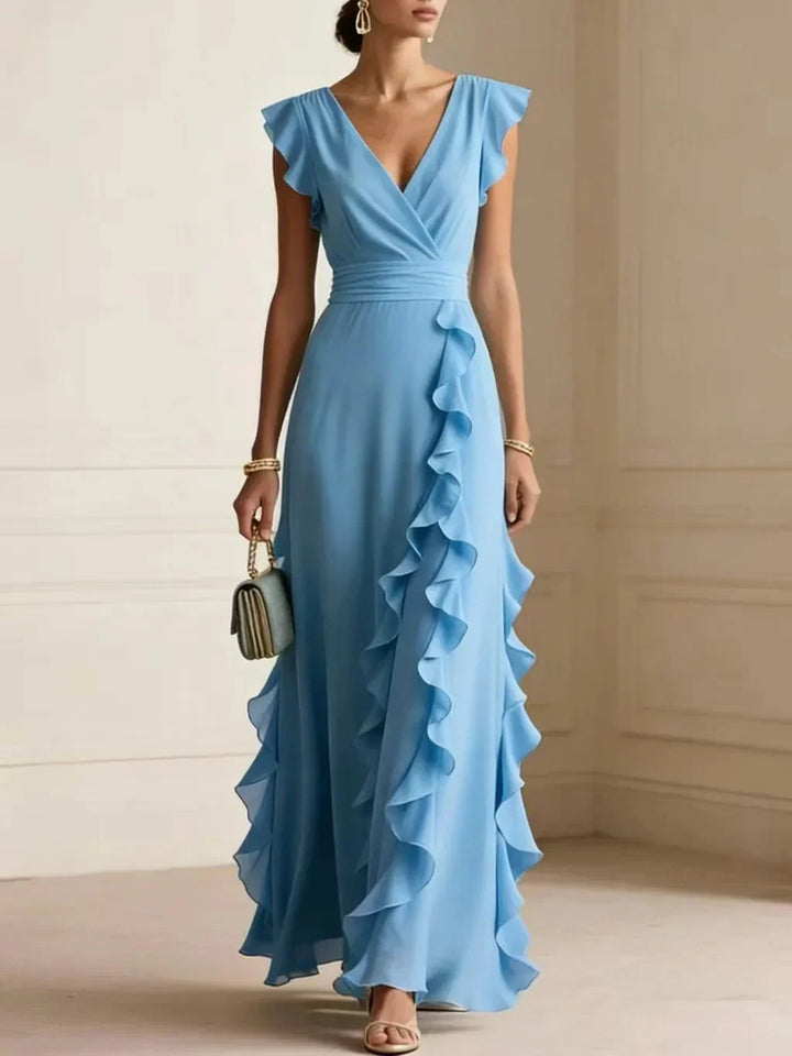 Front view with v-neckline, wrap bodice and side ruffle trim, sky blue