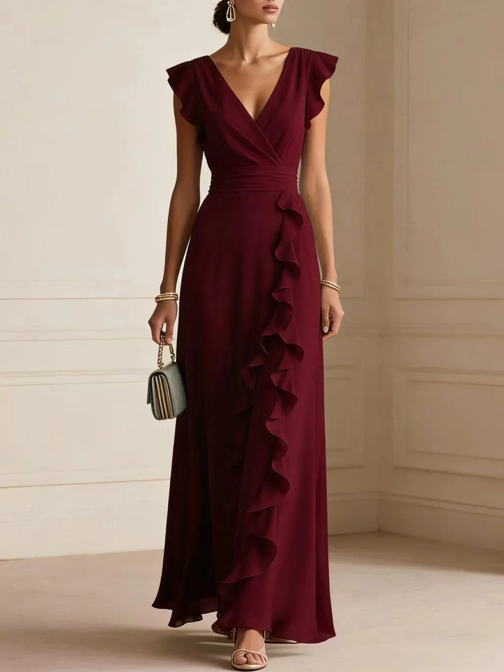 Front view of cap sleeves and cascading ruffle trim, burgundy