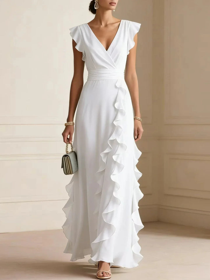 Front view with v-neckline, banded waist and ruffle skirt, white