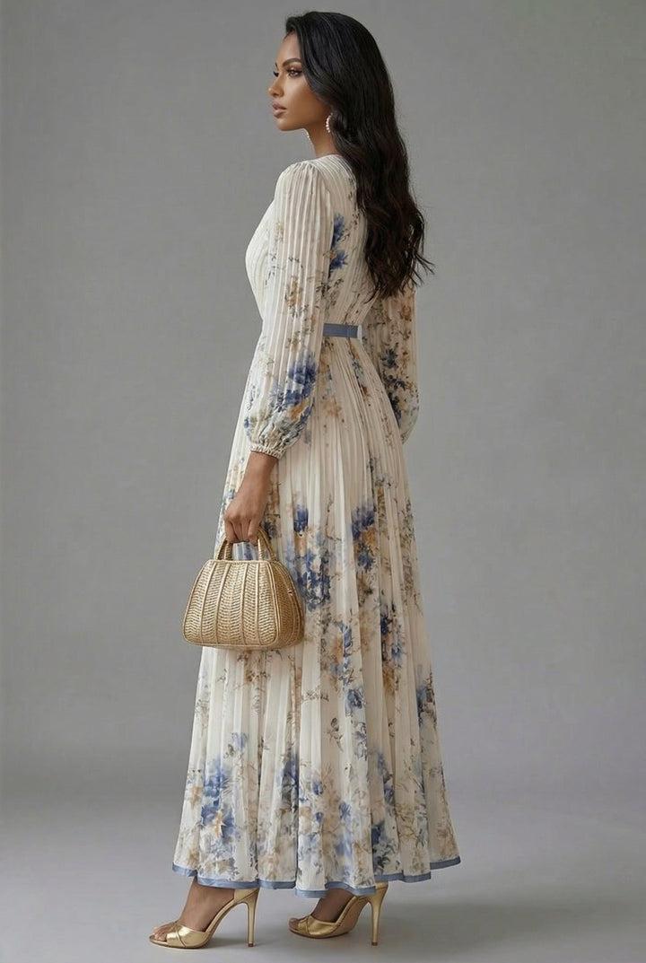 Back view with pleated bodice, banded waist and pleated skirt